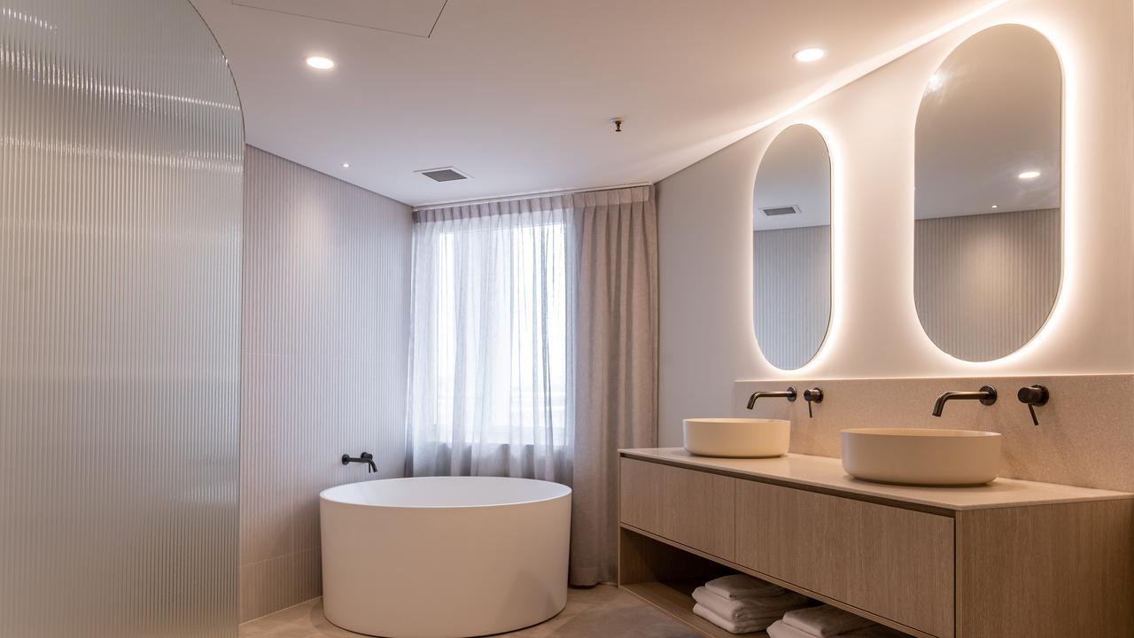 The circular bathtub overlooking the ocean is a real standout, and the in-room wellness kits as part of the Pacific Club experience really add another layer of luxury.