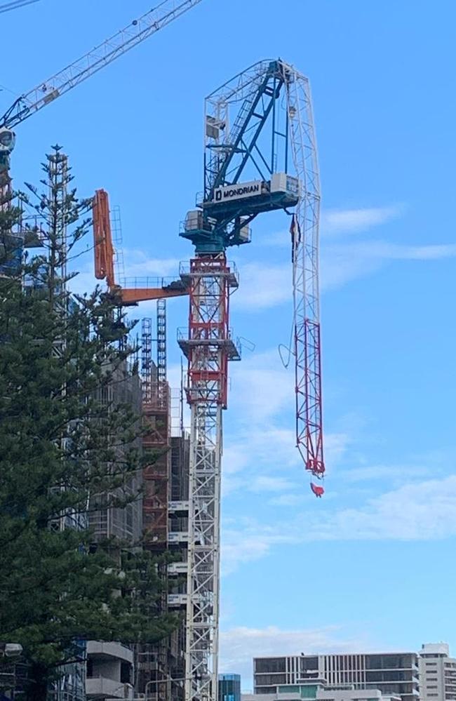 A crane snapped in half at a Burleigh Heads construction site.