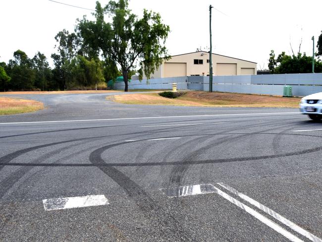 The condition of the road outside Rockhampton Memorial Gardens following mourners' burn outs