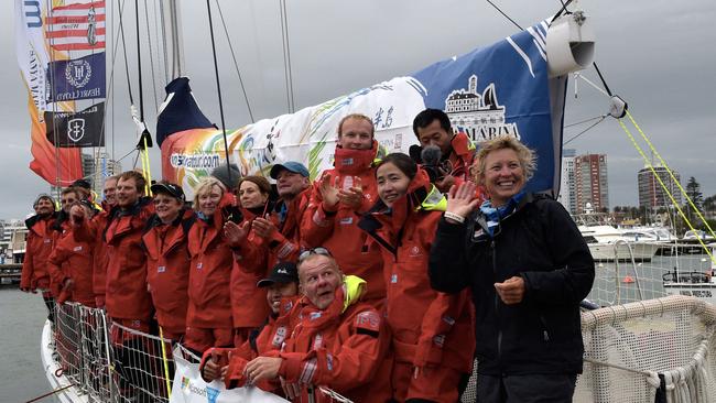Skipper Wendy Tuck (in blue) and crew after winning the first leg. Picture: AFP