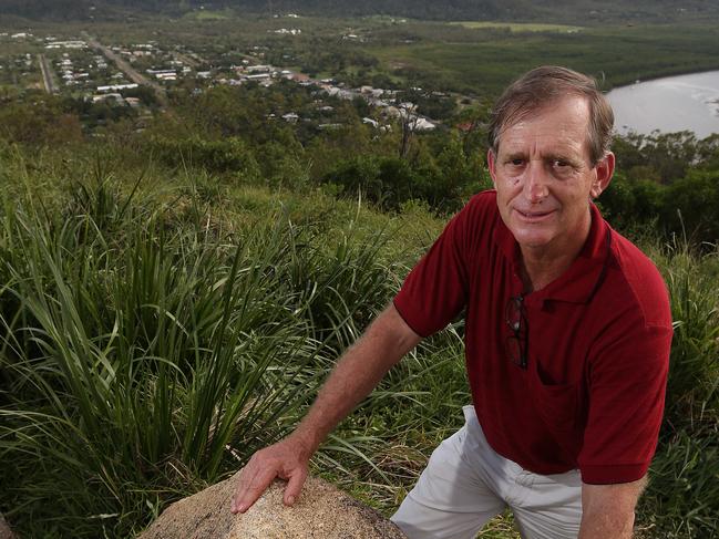 Mayor of Cook shire council , Peter Scott , on Grassy Hill overlooking Cooktown and the Endevour River, happy that the town of Cooktown escaped lightly from Cyclone Ita , Cape York.