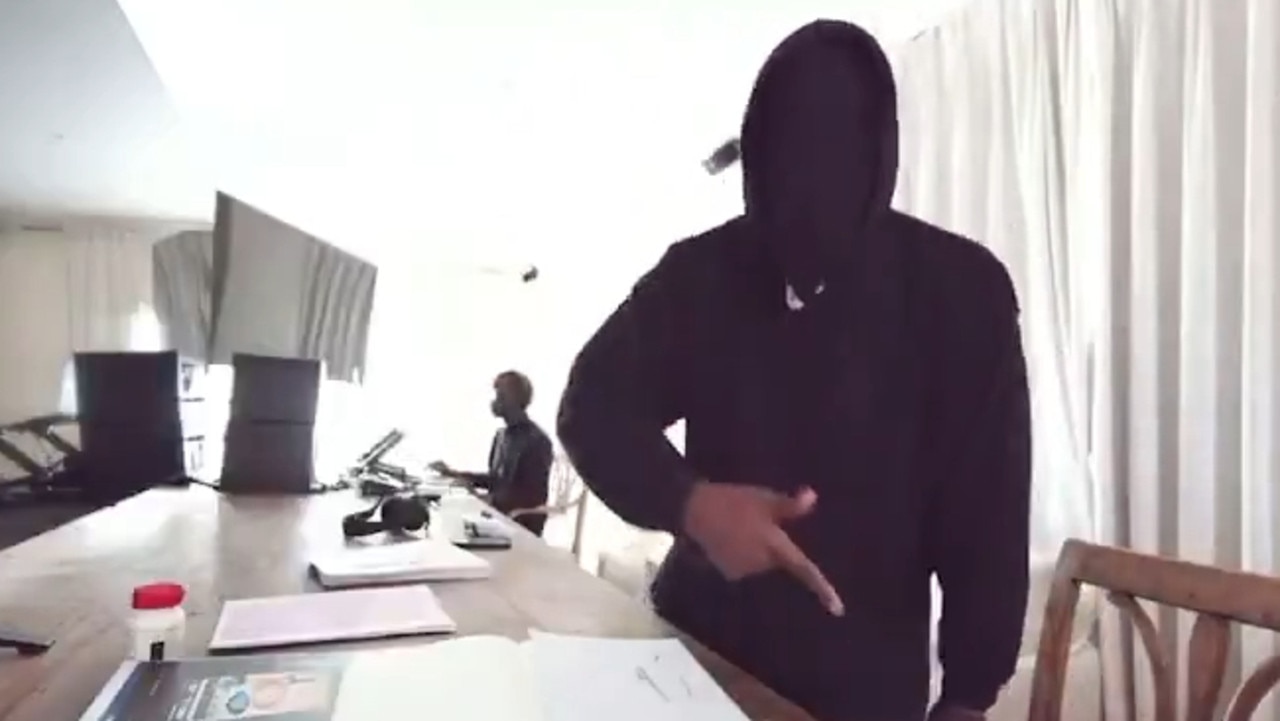 The rapper’s face was completely covered with a black mask during his chaotic tirade.