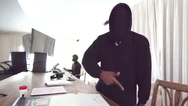 The rapper’s face was completely covered with a black mask during his chaotic tirade.