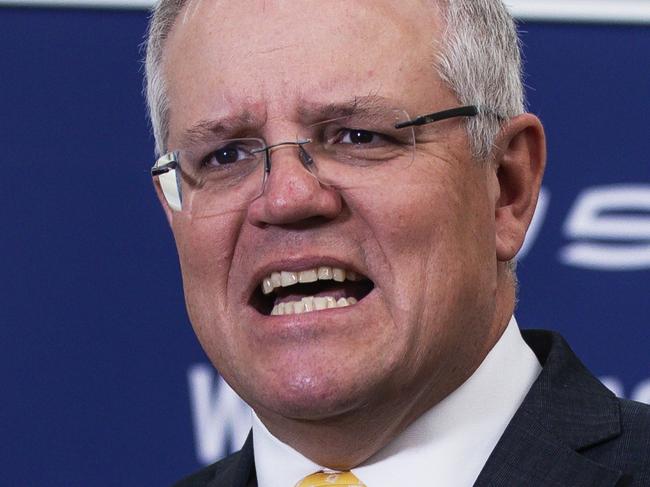 SYDNEY, AUSTRALIA - NewsWire Photos JULY 2: Australian Prime Minister Scott Morrison is pictured as he attends a media opportunity at  defence and space technology company Electro Optic Systems (EOS) in Hume, Canberra. Picture: NCA NewsWire / Terry Cunningham