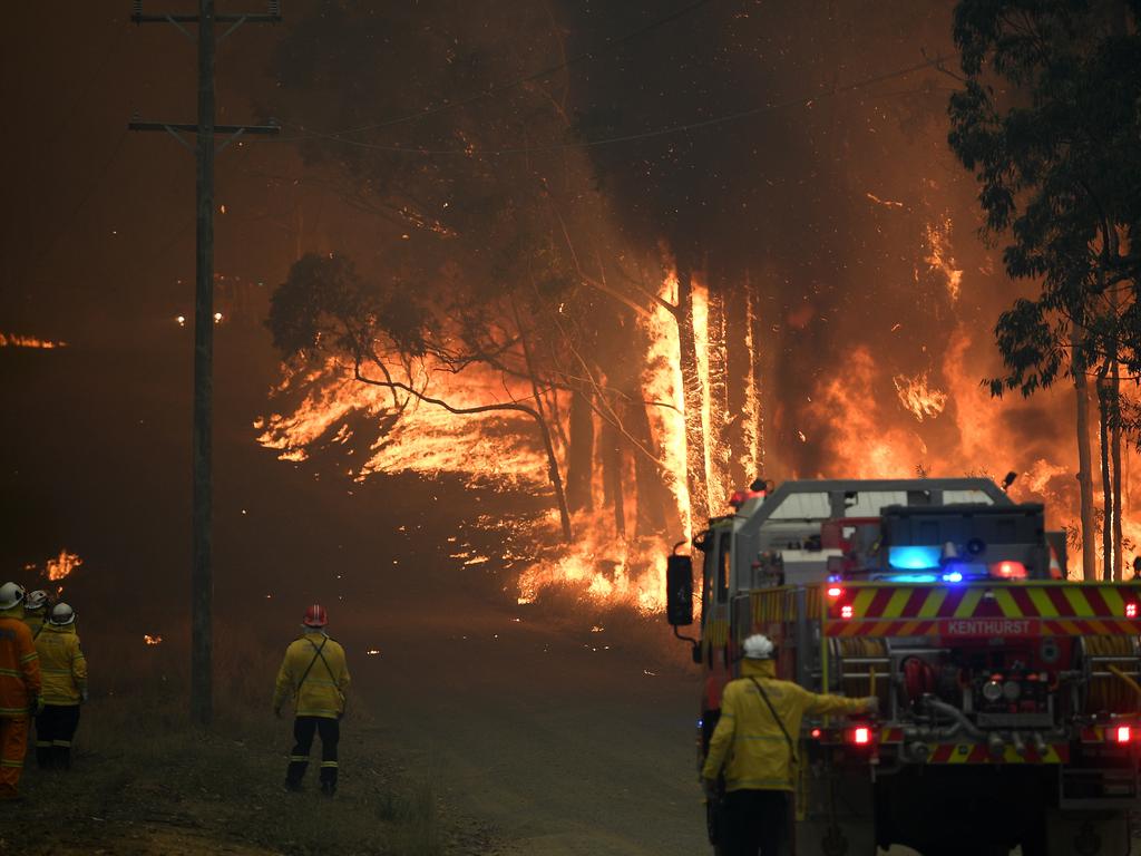 NSW Rural Fire Service crews fight a fire as it burns close to Colo Heights, north west of Sydney. Picture: AAP