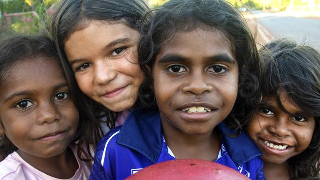 Kids on Mornington Island playing on the island’s main street. Picture: Brian Cassey