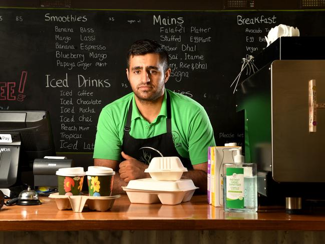 EMPTY CITY STREETS/CORONAVIRUS. Ayla's Cafe owner Arian Razaei (0451669839).  Picture: Tricia WatkinsonAyla's Cafe 13 Bent Street, Adelaide, just off Rundle Street.