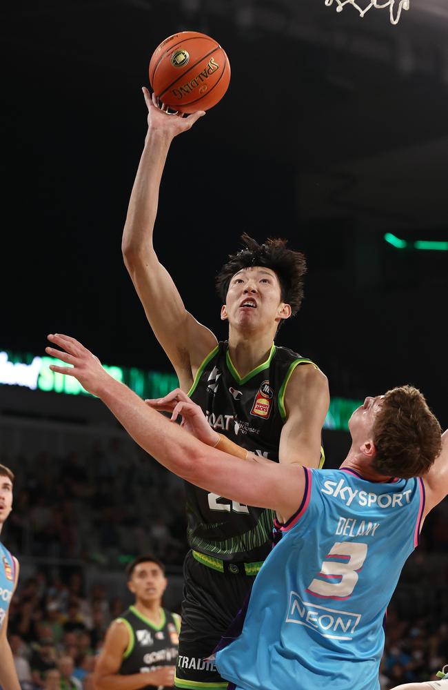 Good luck blocking Zhou Qi. Picture: Michael Klein