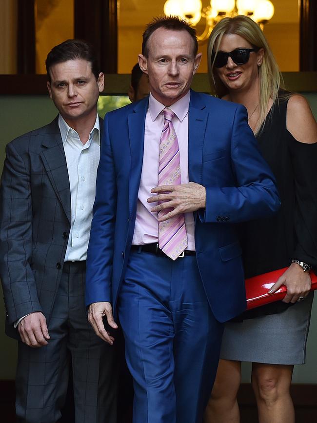 Pat Lennon, centre, with client Danny Nikolic (left) and Nikolic’s girlfriend Tania Hyett (right). Picture: Ellen Smith