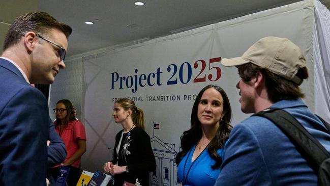 Project 2025 campaign members speak to supporters at the National Conservative Conference in Washington. Picture: Dominic Gwinn/Alamy