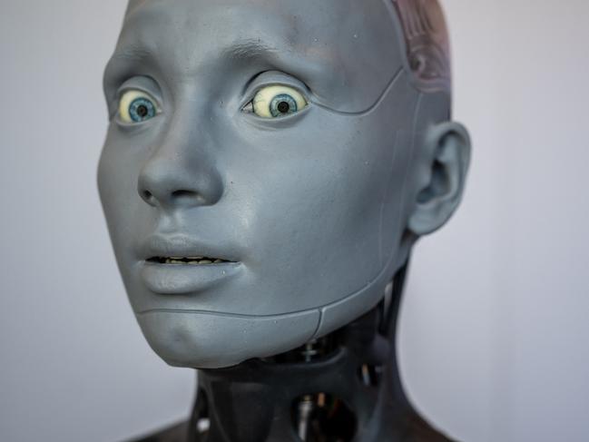 The year of AI: Humanoid AI robot "Ameca" looks on at the booth of Engineered Arts company during the world's largest gathering of humanoid AI Robots in Geneva, on July 5. Picture: Fabrice Coffrini/AFP