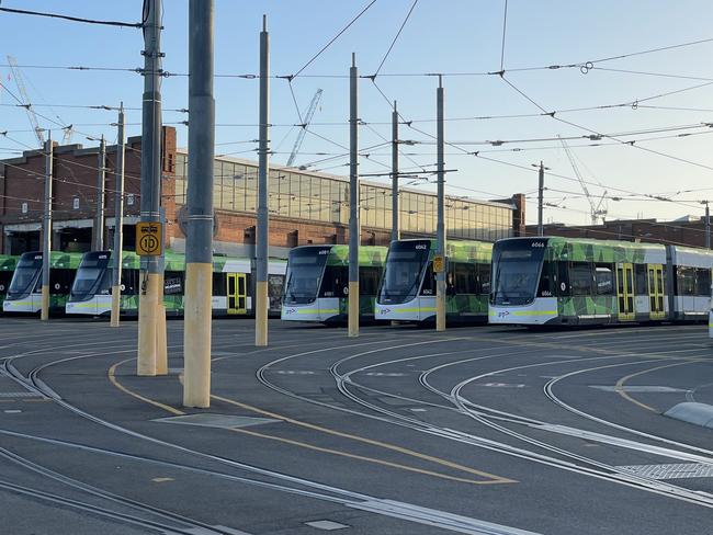 Trams at the Preston tram depot lay dormant at 6am before they are driven out across Melbourne for the day. Picture: Olivia Condous.