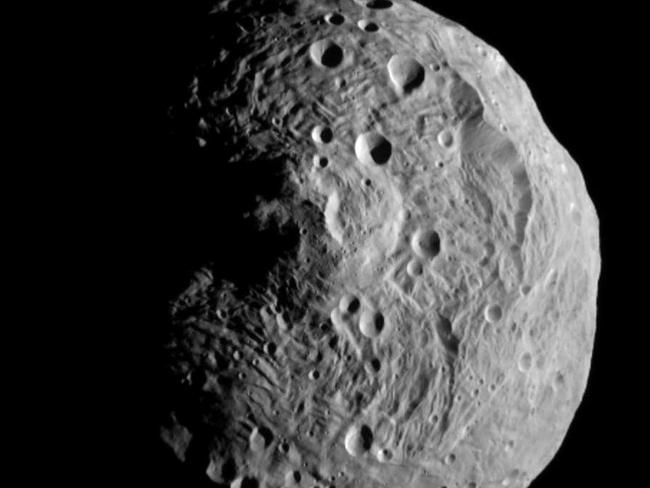 19/07/2011 WIRE: FILE - This file image released by the Jet Propulsion Laboratory on Monday, July 18, 2011 shows the asteroid Vesta, photographed by the Dawn spacecraft on July 17, 2011. The image was taken from a distance of about 9,500 miles (15,000 kilometers) away. (AP Photo/NASA/JPL, File)