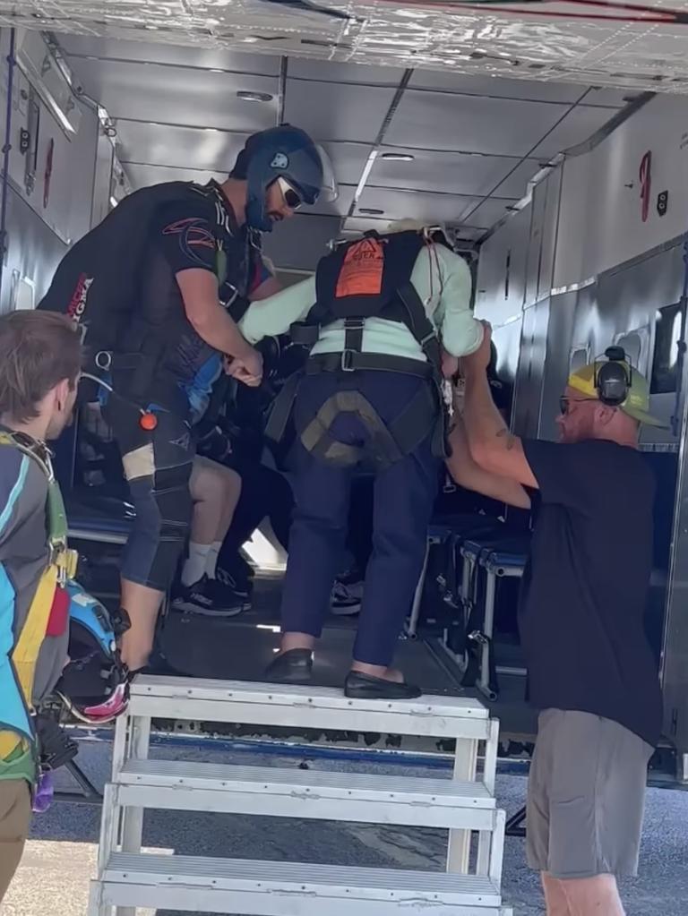 Ms Hoffner was assisted up the steps to board the plane but insisted on leading the jump from 4100m. Picture: Skydive Chicago/Facebook/facebook.com/SkydiveChicago/