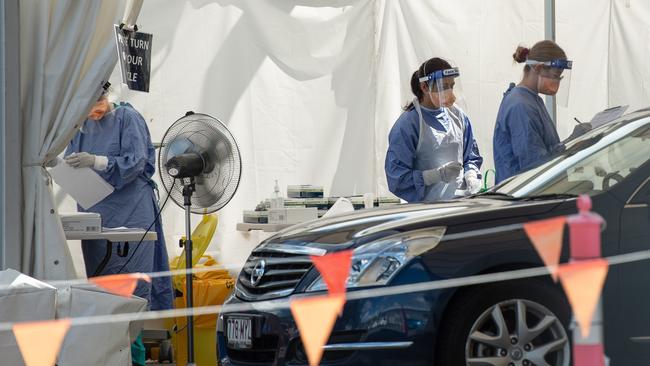 Brisbane residents line up to get COVID tests ahead of a three-day lockdown. Picture: Brad Fleet