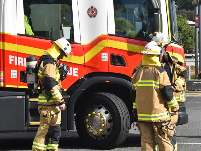 Emergency services responded to a bomb threat at Mt Pleasant Centre with customers and workers evacuated to the KFC car park. Picture: Lillian Watkins fire QFES generic