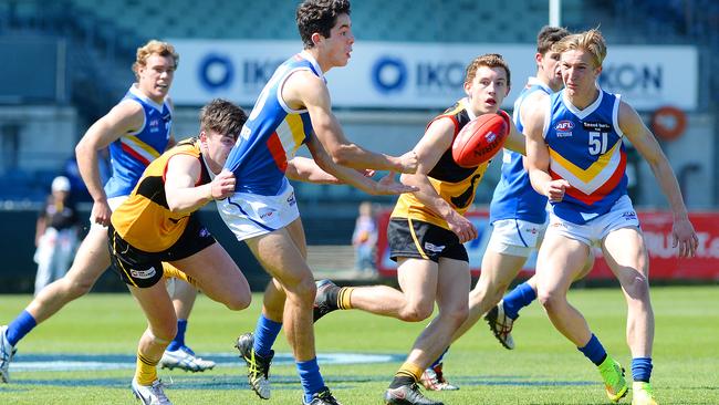 Adam Cerra dishes out a handball against Dandenong Stingrays last year. Picture: Josie Hayden