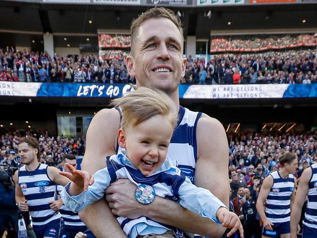 Selwood ran through the Geelong banner holding Levi Ablett. Picture: Getty Images