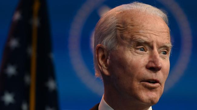 US President-elect Joe Biden speaking in front of his made-up official office. Picture: Roberto Schmidt/AFP