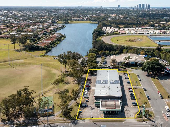 117 Ashmore Rd, with a BP servo fronting the road , Benowa Tavern at the end of Showcase Crt and Amart on the eastern of the court