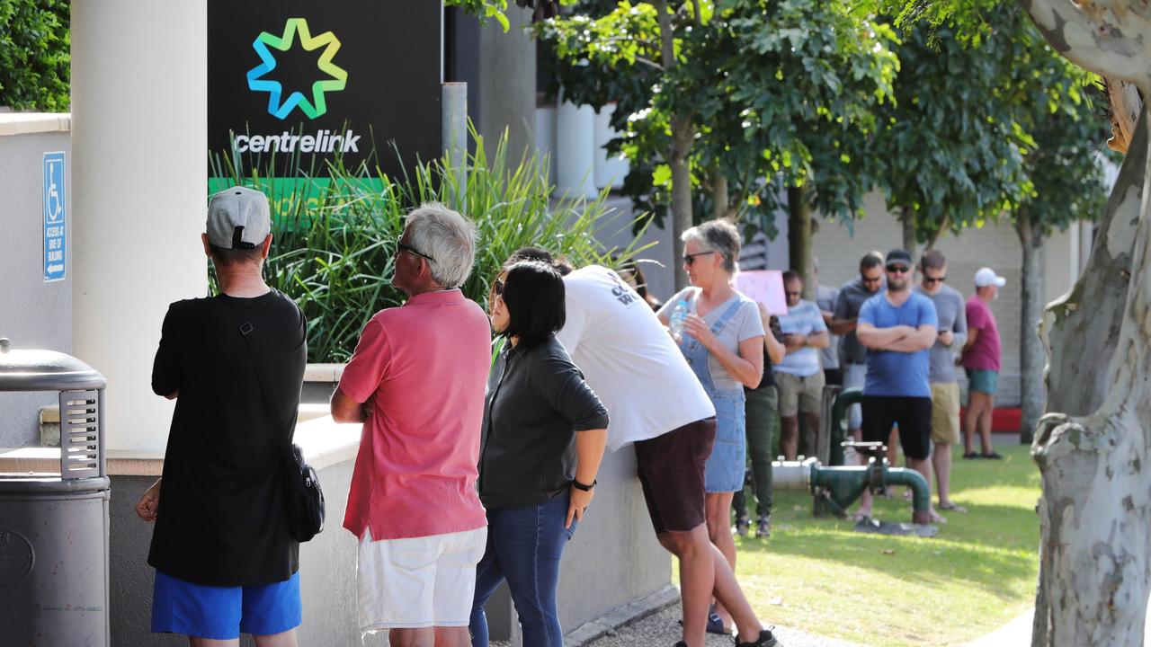 Job losses have led to mass queues outside Centrelink offices across the country. Picture: Glenn Hampson