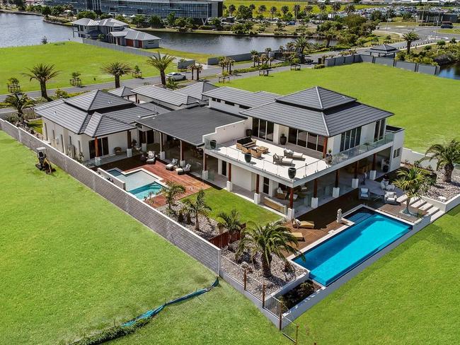 The five-bedroom, five-bathroom home at 5 Entrance Island, Bokarina, which backs onto Lake Kawana, was built in 2017 by its current owners.