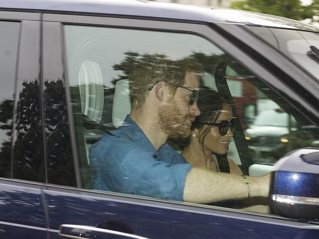 Prince Harry and Meghan Markle, return to Kensington Palace after their wedding. Picture: Australscope