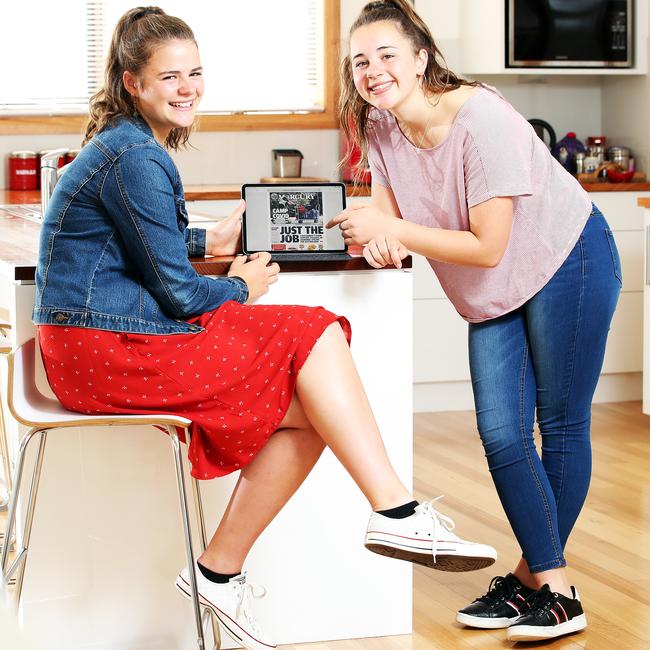 Sisters Molly, 15 and Tilly Hartog, 14 of Mount Nelson check out the Mercury online. Picture: Zak Simmonds