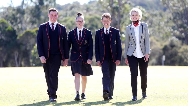 Lakes Grammar student’s Jackson Blackshaw, Casey Young, Alex Voigt with teaching and learning director Michelle Smith. Picture: Sue Graham