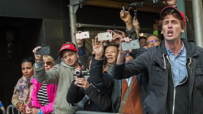 People heckling Trump as he arrives to vote. Picture: Bryan R. Smith