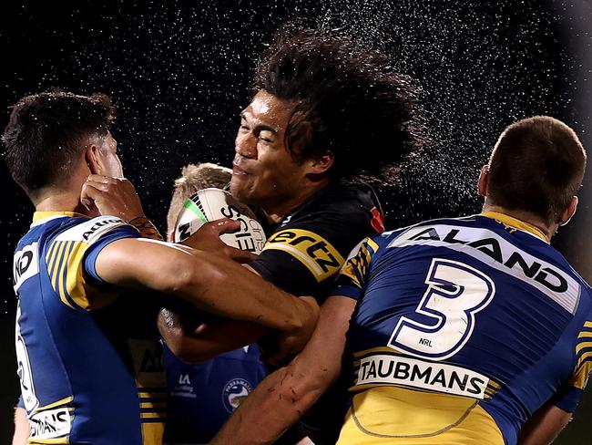 SYDNEY, AUSTRALIA - JULY 02:  Brian To'o of the Panthers is tackled during the round 16 NRL match between the Penrith Panthers and the Parramatta Eels at BlueBet Stadium on July 02, 2021, in Sydney, Australia. (Photo by Mark Kolbe/Getty Images)