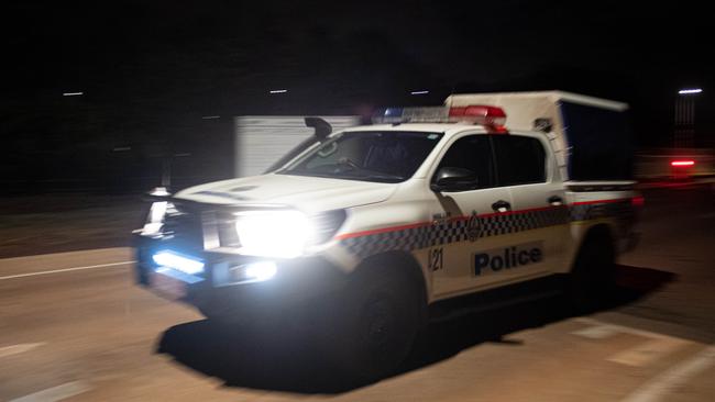 Emergency service vehicles arrive at Darwin Correctional Precinct after a prisoners have been reported on the roof of Darwin Prison. Picture: Che Chorley