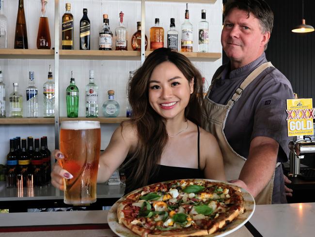 Cairns has a brand new sports bar, with the Brass Bookie opening in the old Outback Jack's building at the corner of Abbott and Aplin Street. Brass Bookie bartender Sinead Tan and head chef Shanon Burgoine are ready to pour plenty of Macalisters pints and serve gourmet pizzas at the bar's grand opening party this Saturday. Picture: Brendan Radke