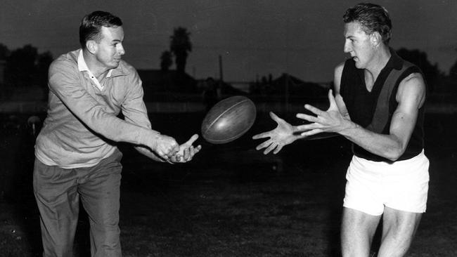 Premiership coach John Coleman with Essendon ruckman Brian Sampson.