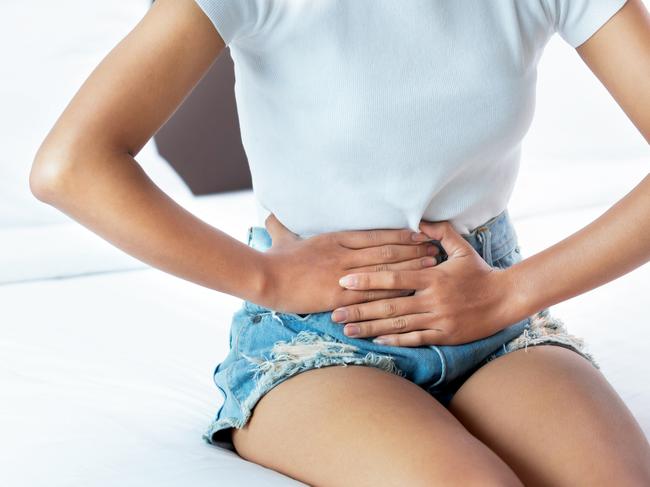 woman Hands holding belly Abdominal pain bowel health Problems  Picture: istock