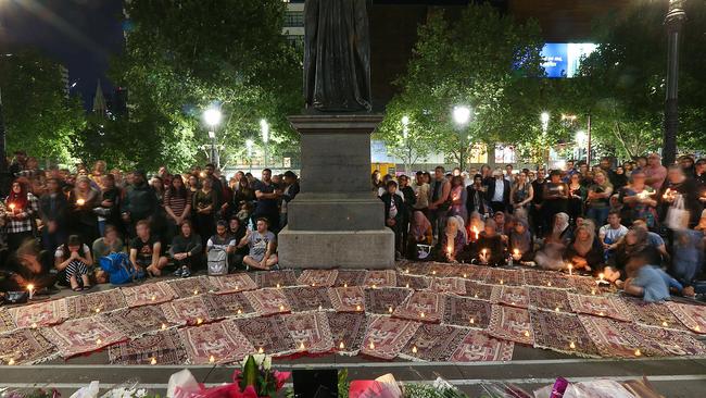 The prayer rugs in the foreground represent the 49 people who were killed. Picture: Ian Currie