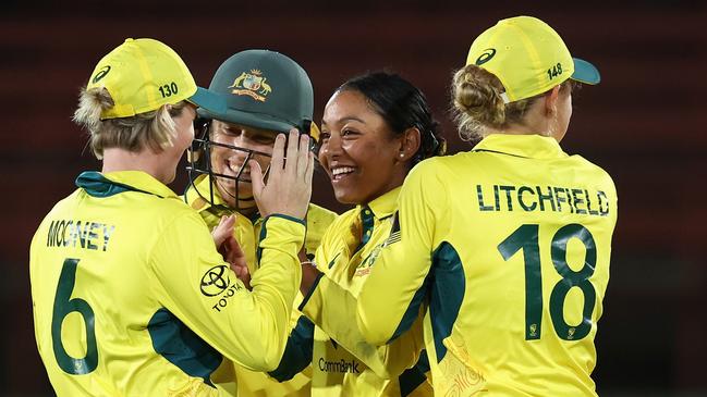 SYDNEY, AUSTRALIA - FEBRUARY 10: Alana King of Australia celebrates with team mates after dismissing Sinalo Jafta of South Africa during game three of the women's One Day International series between Australia and South Africa at North Sydney Oval on February 10, 2024 in Sydney, Australia. (Photo by Cameron Spencer/Getty Images)