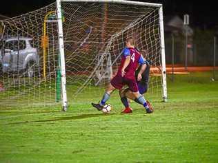 ON A ROLL: Brothers Aston Villa's Jaryd Bennier taps the ball past the United Warriors goal keeper to score one of his nine goals on the night. Picture: Brian Cassidy