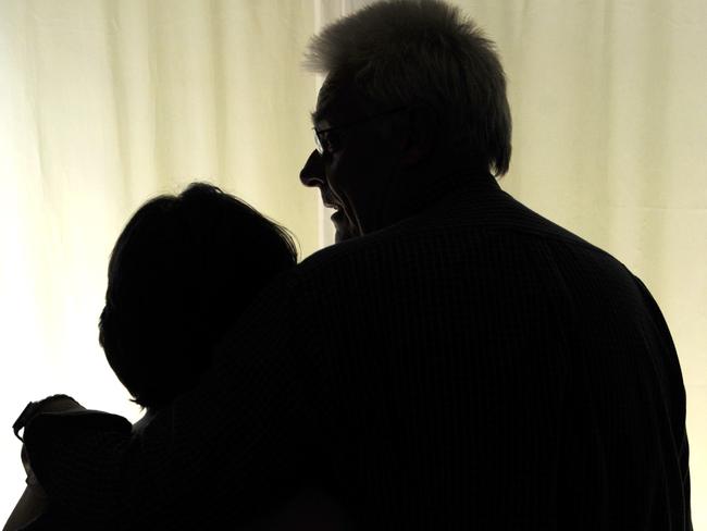 SA couple Tony and Monica who are running under the alias of Karen and David who have advertised for a female egg donor in order to have a baby, after years of trying to conceive through natural and IVF methods. Silhouette of man and woman holding teddy bear.