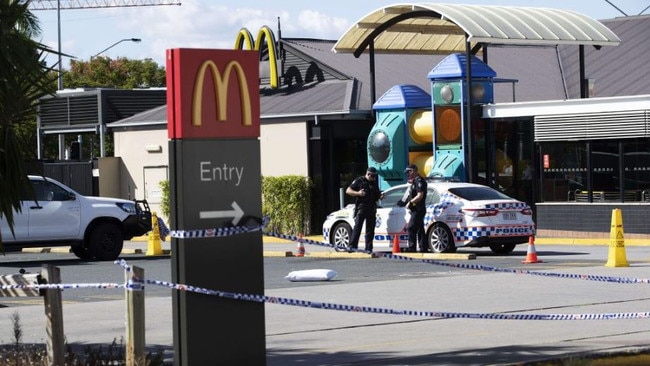 The crime scene at the police shooting at McDonald’s Sunnybank. (AAP Image/Attila Csaszar)