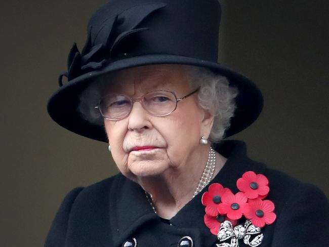 LONDON, ENGLAND - NOVEMBER 08: Queen Elizabeth II looks on during the Service of Remembrance at the Cenotaph at The Cenotaph on November 08, 2020 in London, England. Remembrance Sunday services are still able to go ahead despite the covid-19 measures in place across the various nations of the UK. Each country has issued guidelines to ensure the safety of those taking part. (Photo by Chris Jackson/Getty Images)