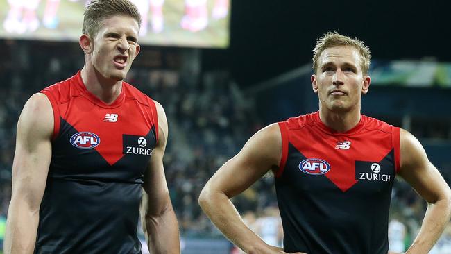 Sam Frost and Bernie Vince leave the field after the loss. Pic: Michael Klein