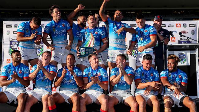 The Sydney Roosters celebrate winning the 2017 Auckland Nines final.