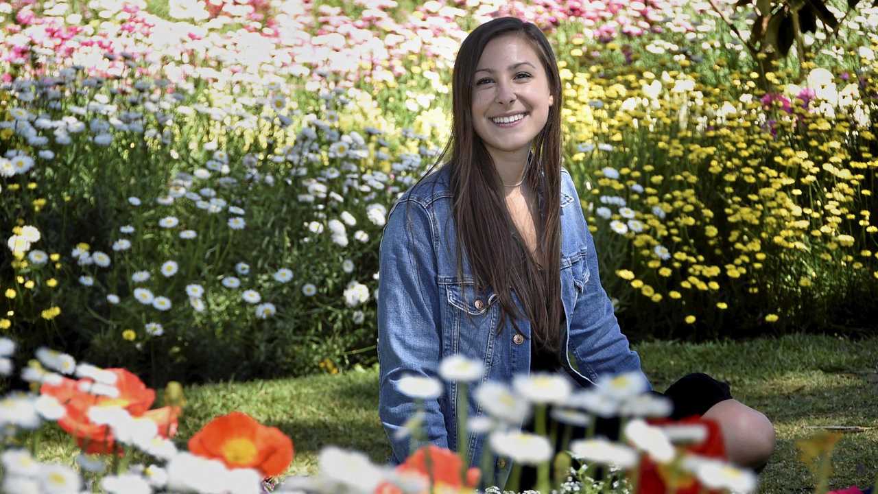 Exchange student Olivia Kuchta from the United States enjoys the colour at Laurel Bank Park. Picture: Bev Lacey