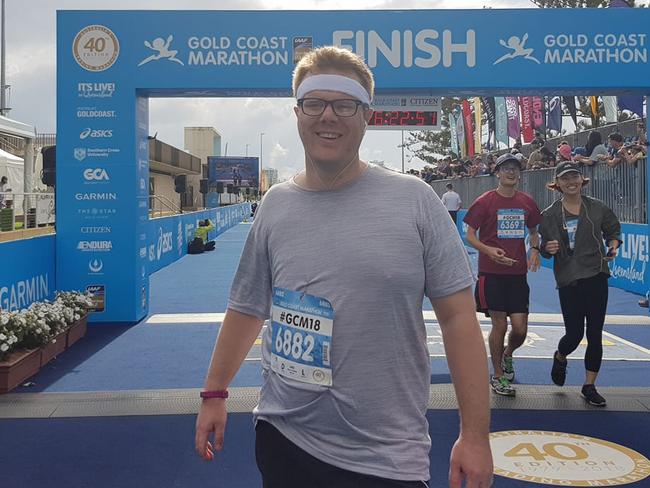 Gold Coast Bulletin journalist Alister Thomson successfully finishes the Gold Coast Marathon. Photo: Tanya Westthorp