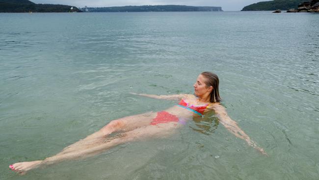 Balmoral Beach goer Natalie Blakley isn’t deterred by this week’s shark attack. Picture: Max Mason-Hubers