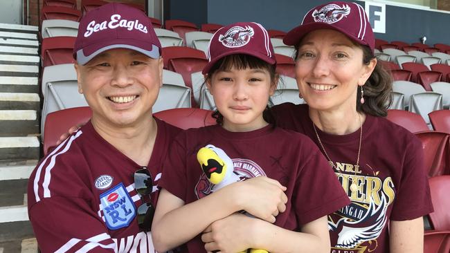 Manly fans Alf Czharn, daughter Erin and wife Debbie at Brookvale Oval.