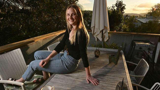 Hopeful first-home buyer Megan Moon, 27, at her rental home in Red Hill, Brisbane, wants to make sure she can service her home loan. Picture: Lyndon Mechielsen