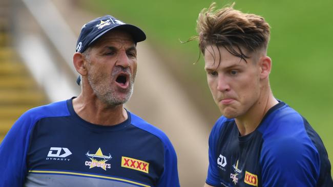 North Queensland Cowboys training at Willows Sports Complex. Assistant coach Steve Georgallis gives encouragement to Michael Bell. Picture: Evan Morgan