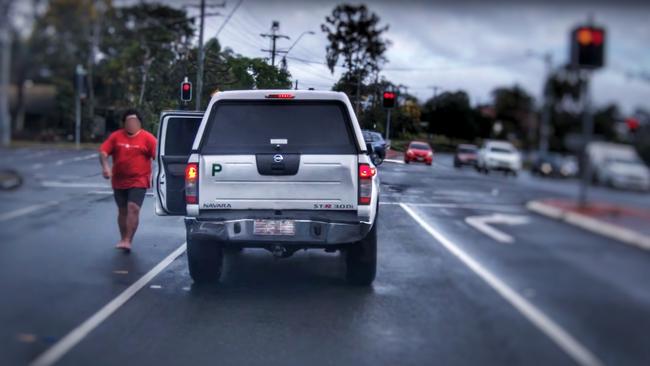 Video footage shows the terrifying moment a white Nissan Navara stalked a gold sedan at Collingwood Park, Ipswich, before an enraged passenger got out of the ute and confronted the driver. Picture: Brett Lynch/YouTube